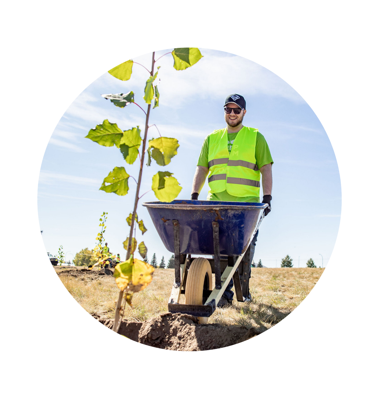 GoGreen Volunteer with wheelbarrow